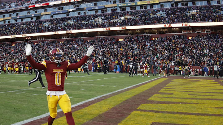Dec 22, 2024; Landover, Maryland, USA; Washington Commanders cornerback Mike Sainristil (0) celebrates after the Commanders' game against the Philadelphia Eagles at Northwest Stadium. Mandatory Credit: Geoff Burke-Imagn Images Dec 22, 2024; Landover, Maryland, USA; Washington Commanders cornerback Mike Sainristil (0) celebrates after the Commanders' game against the Philadelphia Eagles at Northwest Stadium. Mandatory Credit: Geoff Burke-Imagn Images