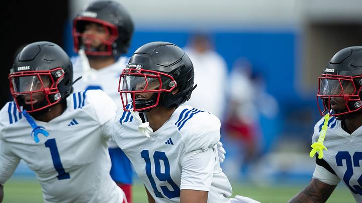 Kansas cornerbacks junior Jalen Todd (1) and redshirt freshman Chris McCorkle (19), as well as redshirt sophomore safetey Khijohnn Cummings-Coleman (22), work on drills during practice at Kivisto Field inside David Booth Kansas Memorial Stadium on Aug. 14, 2026. Kansas cornerbacks junior Jalen Todd (1) and redshirt freshman Chris McCorkle (19), as well as redshirt sophomore safetey Khijohnn Cummings-Coleman (22), work on drills during practice at Kivisto Field inside David Booth Kansas Memorial Stadium on Aug. 14, 2026.