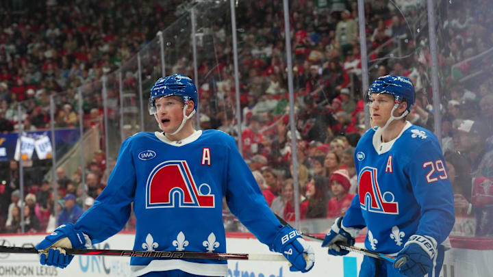 Jan 3, 2026; Raleigh, North Carolina, USA; Colorado Avalanche defenseman Cale Makar (8) and center Nathan MacKinnon (29) look on during the third period against the Carolina Hurricanes at Lenovo Center. Mandatory Credit: James Guillory-Imagn Images