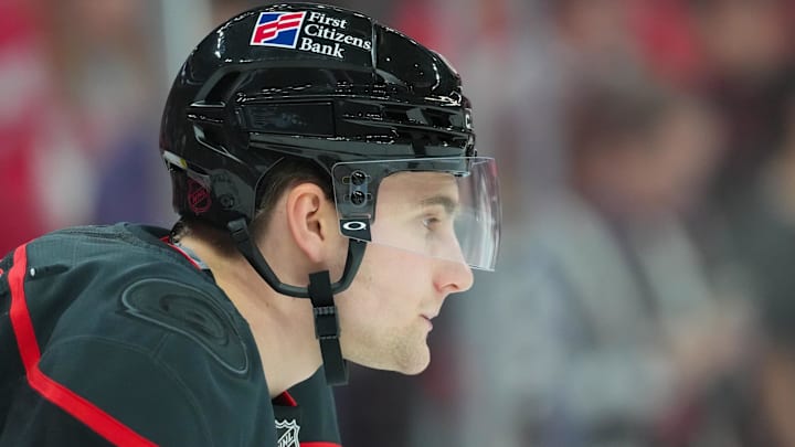 Dec 27, 2025; Raleigh, North Carolina, USA;  Carolina Hurricanes defenseman Joel Nystrom (64) looks on during the warmups before the game against the Detroit Red Wings at Lenovo Center. Mandatory Credit: James Guillory-Imagn Images
