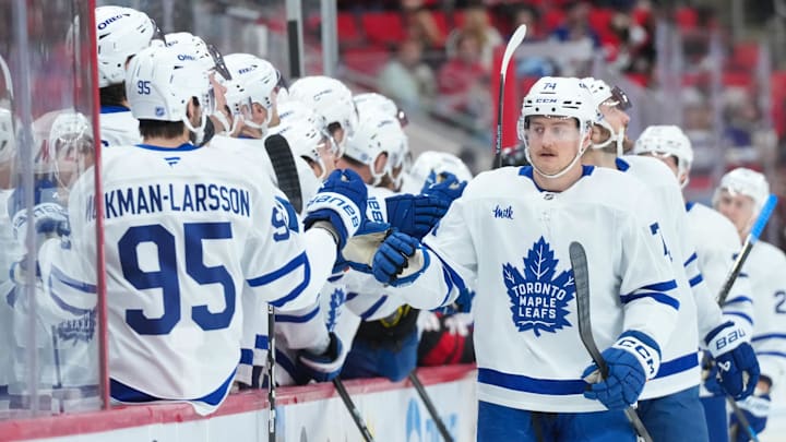 Dec 4, 2025; Raleigh, North Carolina, USA; Toronto Maple Leafs center Bobby McMann (74) celebrates his goal against the Carolina Hurricanes during the first period at Lenovo Center. Mandatory Credit: James Guillory-Imagn Images Dec 4, 2025; Raleigh, North Carolina, USA; Toronto Maple Leafs center Bobby McMann (74) celebrates his goal against the Carolina Hurricanes during the first period at Lenovo Center. Mandatory Credit: James Guillory-Imagn Images