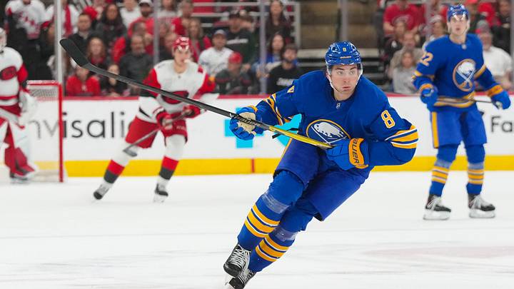Nov 8, 2025; Raleigh, North Carolina, USA;  Buffalo Sabres defenseman Michael Kesselring (8) skates after the puck against the Carolina Hurricanes during the third period at Lenovo Center. Mandatory Credit: James Guillory-Imagn Images