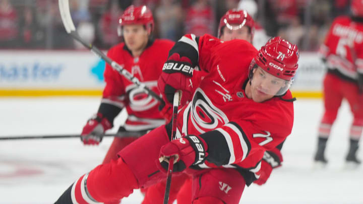 Mar 29, 2026; Raleigh, North Carolina, USA; Carolina Hurricanes left wing Taylor Hall (71) takes a shot during the warmups before the game against the Montreal Canadiens at Lenovo Center. Mandatory Credit: James Guillory-Imagn Images Mar 29, 2026; Raleigh, North Carolina, USA; Carolina Hurricanes left wing Taylor Hall (71) takes a shot during the warmups before the game against the Montreal Canadiens at Lenovo Center. Mandatory Credit: James Guillory-Imagn Images