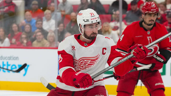 Feb 28, 2026; Raleigh, North Carolina, USA; Detroit Red Wings center Dylan Larkin (71) takes a shot against the Carolina Hurricanes during the second period at Lenovo Center. Mandatory Credit: James Guillory-Imagn Images Feb 28, 2026; Raleigh, North Carolina, USA; Detroit Red Wings center Dylan Larkin (71) takes a shot against the Carolina Hurricanes during the second period at Lenovo Center. Mandatory Credit: James Guillory-Imagn Images