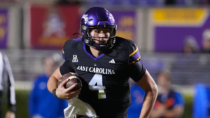 Oct 16, 2025; Greenville, N.C.; East Carolina quarterback Katin Houser (4) runs with the ball against Tulsa.