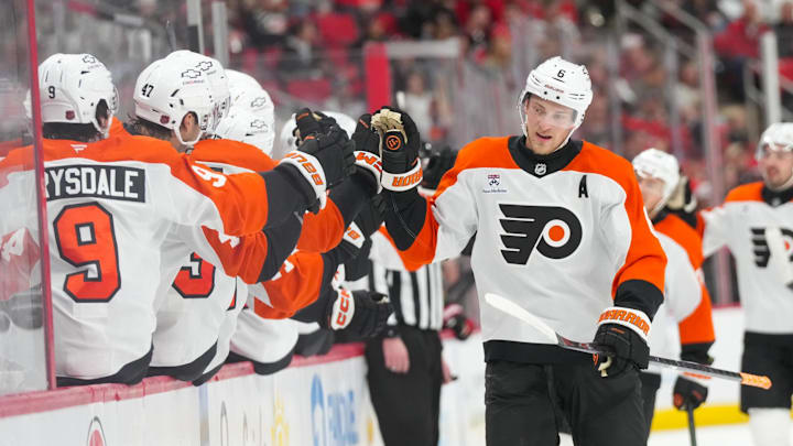 Oct 11, 2025; Raleigh, North Carolina, USA;  Philadelphia Flyers defenseman Travis Sanheim (6) celebrates his goal against the Carolina Hurricanes during the third period at Lenovo Center. Mandatory Credit: James Guillory-Imagn Images