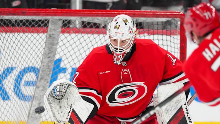 Dec 9, 2025; Raleigh, North Carolina, USA; Carolina Hurricanes goaltender Brandon Bussi (32) watches the shot during the warmups before the game against the Columbus Blue Jackets at Lenovo Center. Mandatory Credit: James Guillory-Imagn Images Dec 9, 2025; Raleigh, North Carolina, USA; Carolina Hurricanes goaltender Brandon Bussi (32) watches the shot during the warmups before the game against the Columbus Blue Jackets at Lenovo Center. Mandatory Credit: James Guillory-Imagn Images