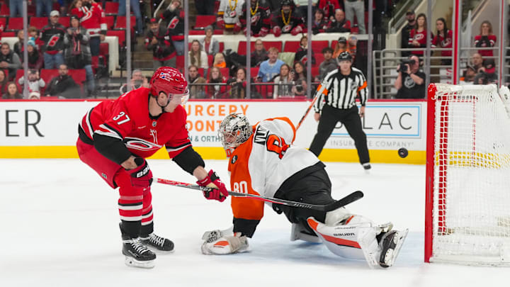 Dec 14, 2025; Raleigh, North Carolina, USA; Carolina Hurricanes right wing Andrei Svechnikov (37) scores the game winner in the shootout past Philadelphia Flyers goaltender Dan Vladar (80) at Lenovo Center. Mandatory Credit: James Guillory-Imagn Images Dec 14, 2025; Raleigh, North Carolina, USA; Carolina Hurricanes right wing Andrei Svechnikov (37) scores the game winner in the shootout past Philadelphia Flyers goaltender Dan Vladar (80) at Lenovo Center. Mandatory Credit: James Guillory-Imagn Images