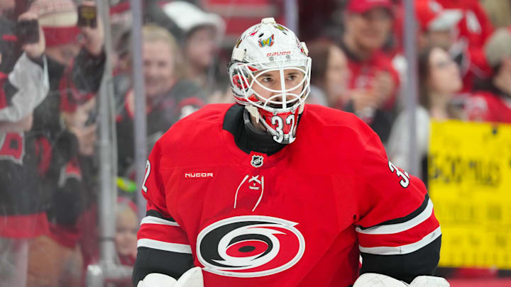 Jan 16, 2026; Raleigh, North Carolina, USA;  Carolina Hurricanes goaltender Brandon Bussi (32) skates during the warmups before the game against the Florida Panthers at Lenovo Center. Mandatory Credit: James Guillory-Imagn Images
