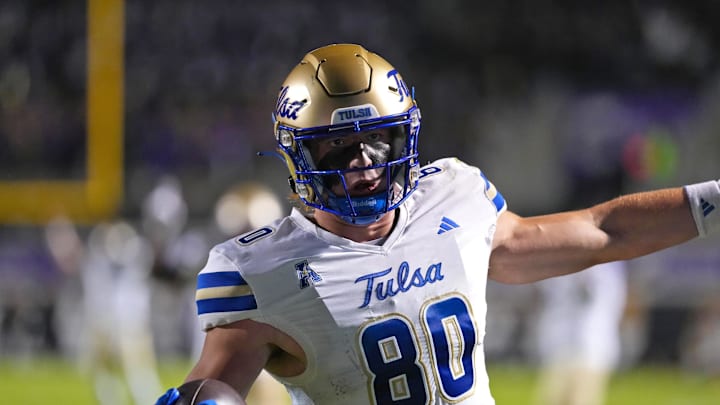 Oct 16, 2025; Greenville, North Carolina, USA;  Tulsa Golden Hurricane tight end Brody Foley (80) scores a touchdown on his catch against the East Carolina Pirates during the first half at Dowdy-Ficklen Stadium. Mandatory Credit: James Guillory-Imagn Images