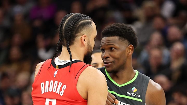 Feb 6, 2025; Minneapolis, Minnesota, USA; Houston Rockets forward Dillon Brooks (9) and Minnesota Timberwolves guard Anthony Edwards (5) exchange words during the second quarter at Target Center. Mandatory Credit: Matt Krohn-Imagn Images