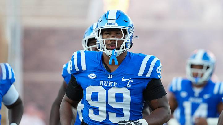 Duke Blue Devils defensive tackle Aaron Hall (99) comes out onto the field 