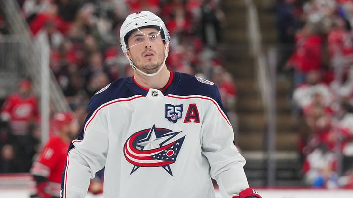 Dec 9, 2025; Raleigh, North Carolina, USA;  Columbus Blue Jackets defenseman Zach Werenski (8) looks up against the Carolina Hurricanes during the second period at Lenovo Center. Mandatory Credit: James Guillory-Imagn Images