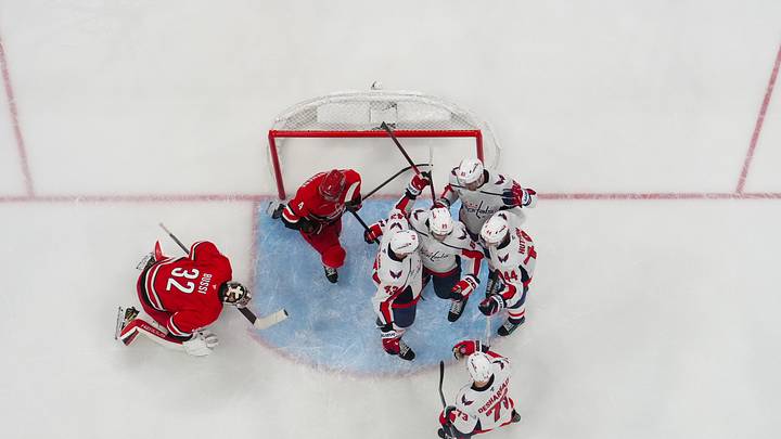 Oct 2, 2026; Raleigh, North Carolina, USA; Washington Capitals right wing Alex Tuch (89) is congratulated by right wing Tom Wilson (43) defenseman Cole Hutson (44) defenseman Vincent Desharnais (73) and center Pierre-Luc Dubois (80) after his goal past Carolina Hurricanes goaltender Brandon Bussi (32) and defenseman Shayne Gostisbehere (4) during the first period Lenovo Center. Mandatory Credit: James Guillory-Imagn Images Oct 2, 2026; Raleigh, North Carolina, USA; Washington Capitals right wing Alex Tuch (89) is congratulated by right wing Tom Wilson (43) defenseman Cole Hutson (44) defenseman Vincent Desharnais (73) and center Pierre-Luc Dubois (80) after his goal past Carolina Hurricanes goaltender Brandon Bussi (32) and defenseman Shayne Gostisbehere (4) during the first period Lenovo Center. Mandatory Credit: James Guillory-Imagn Images