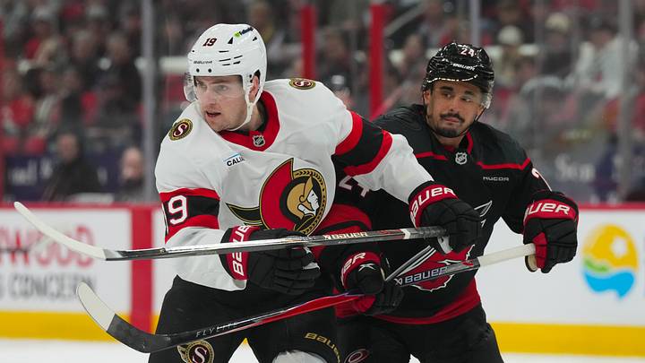 Apr 20, 2026; Raleigh, North Carolina, USA; Carolina Hurricanes center Seth Jarvis (24) and Ottawa Senators right wing Drake Batherson (19) battle in the first overtime period in game two of the first round of the 2026 Stanley Cup Playoffs at Lenovo Center. Mandatory Credit: James Guillory-Imagn Images Apr 20, 2026; Raleigh, North Carolina, USA; Carolina Hurricanes center Seth Jarvis (24) and Ottawa Senators right wing Drake Batherson (19) battle in the first overtime period in game two of the first round of the 2026 Stanley Cup Playoffs at Lenovo Center. Mandatory Credit: James Guillory-Imagn Images