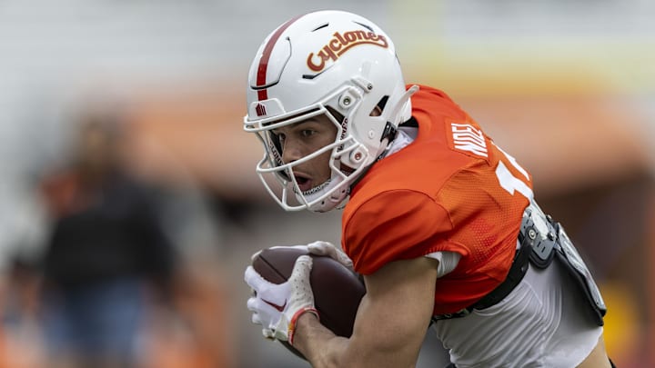 Jan 30, 2025; Mobile, AL, USA; National team wide receiver Jaylin Noel of Iowa State (12) works through drills during Senior Bowl practice for the National team at Hancock Whitney Stadium.