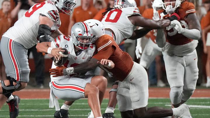 Sep 12, 2026; Austin, Texas, USA; Texas Longhorns defensive end Colin Simmons (1) sacks Ohio State Buckeyes quarterback Julian Sayin (10) during the first half at Darrell K Royal-Texas Memorial Stadium. Mandatory Credit: Scott Wachter-Imagn Images Sep 12, 2026; Austin, Texas, USA; Texas Longhorns defensive end Colin Simmons (1) sacks Ohio State Buckeyes quarterback Julian Sayin (10) during the first half at Darrell K Royal-Texas Memorial Stadium. Mandatory Credit: Scott Wachter-Imagn Images