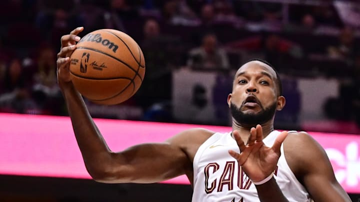 Cleveland Cavaliers forward Evan Mobley goes for a rebound against Indiana Pacers forward Pascal Siakam.