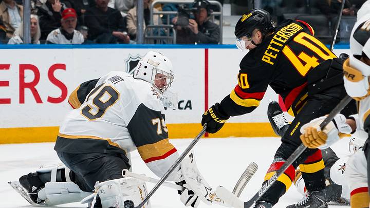 Apr 7, 2026; Vancouver, British Columbia, CAN; Vegas Golden Knights goalie Carter Hart (79) makes a save on Vancouver Canucks forward Elias Pettersson (40) in the second period at Rogers Arena. Mandatory Credit: Bob Frid-Imagn Images Apr 7, 2026; Vancouver, British Columbia, CAN; Vegas Golden Knights goalie Carter Hart (79) makes a save on Vancouver Canucks forward Elias Pettersson (40) in the second period at Rogers Arena. Mandatory Credit: Bob Frid-Imagn Images