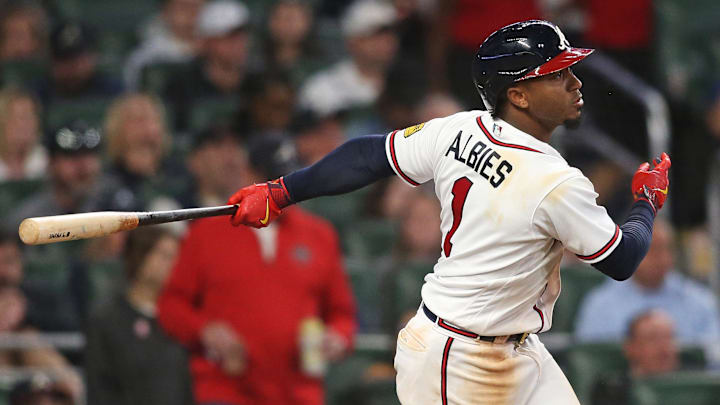 Oct 7, 2023; Cumberland, Georgia, USA; Atlanta Braves second baseman Ozzie Albies (1) hits a single