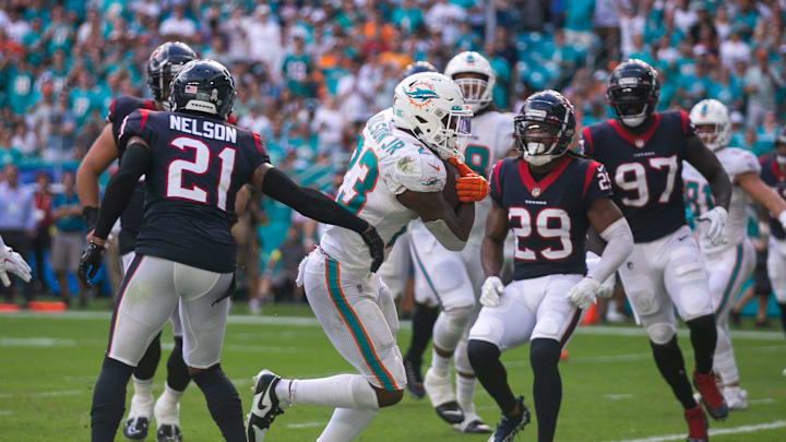Miami Dolphins running back Jeff Wilson Jr. (23) runs into the end zone to score the Dolphins' first touchdown in the first quarter of the game between host Miami Dolphins and the Houston Texans at Hard Rock Stadium on Sunday, November 27, 2022, in Miami Gardens, FL. Miami Dolphins running back Jeff Wilson Jr. (23) runs into the end zone to score the Dolphins' first touchdown in the first quarter of the game between host Miami Dolphins and the Houston Texans at Hard Rock Stadium on Sunday, November 27, 2022, in Miami Gardens, FL.