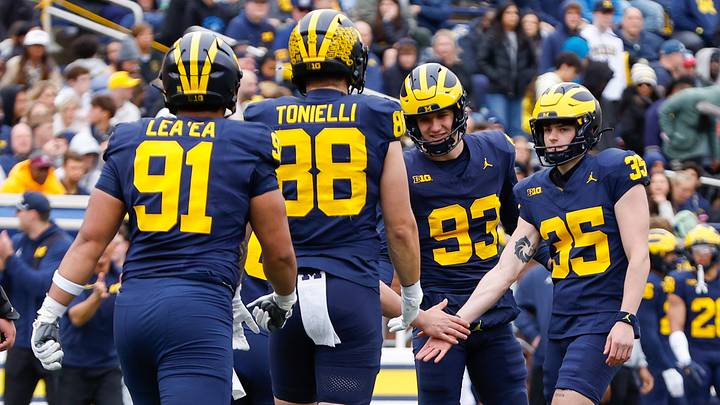 Apr 18, 2026; Ann Arbor, MI, USA; Michigan Wolverines kicker Stuart Blake (35) high fives teammates after kicking during the first half at Michigan Stadium. Mandatory Credit: Brian Bradshaw Sevald-Imagn Images Apr 18, 2026; Ann Arbor, MI, USA; Michigan Wolverines kicker Stuart Blake (35) high fives teammates after kicking during the first half at Michigan Stadium. Mandatory Credit: Brian Bradshaw Sevald-Imagn Images