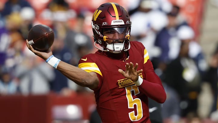 Nov 24, 2024; Landover, Maryland, USA; Washington Commanders quarterback Jayden Daniels (5) participates in warmup prior to the game against the Dallas Cowboys at Northwest Stadium. Mandatory Credit: Geoff Burke-Imagn Images Nov 24, 2024; Landover, Maryland, USA; Washington Commanders quarterback Jayden Daniels (5) participates in warmup prior to the game against the Dallas Cowboys at Northwest Stadium. Mandatory Credit: Geoff Burke-Imagn Images