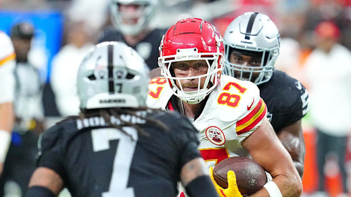 Oct 27, 2024; Paradise, Nevada, USA; Kansas City Chiefs tight end Travis Kelce (87) looks to gain yardage against the Las Vegas Raiders during the fourth quarter at Allegiant Stadium. Mandatory Credit: Stephen R. Sylvanie-Imagn Images