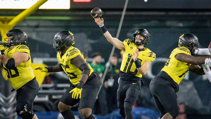 Oregon quarterback Bo Nix throws out a pass as the No. 6 Oregon Ducks host the USC Trojans Saturday,