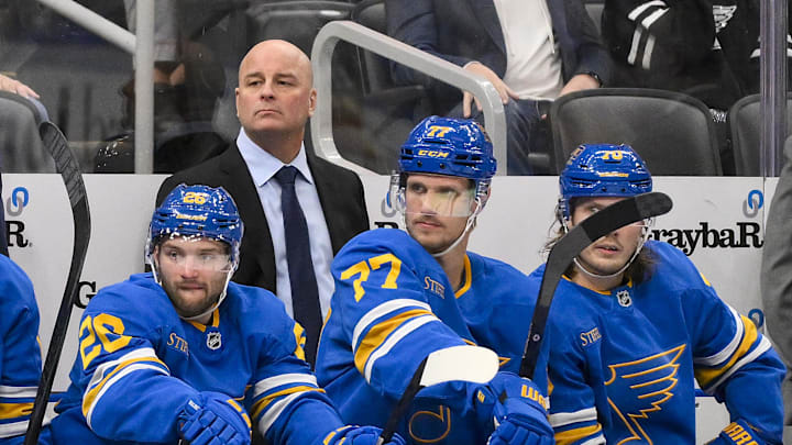 Nov 15, 2025; St. Louis, Missouri, USA; St. Louis Blues head coach Jim Montgomery looks on during the third period against the Vegas Golden Knights at Enterprise Center. Mandatory Credit: Jeff Curry-Imagn Images