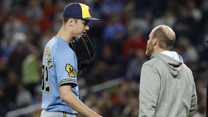 May 1, 2026; Washington, District of Columbia, USA; Milwaukee Brewers pitcher Jacob Misiorowski (32) talks with Brewers head trainer Brad Epstein (R) after an injury against the Washington Nationals during the sixth inning at Nationals Park. Mandatory Credit: Geoff Burke-Imagn Images