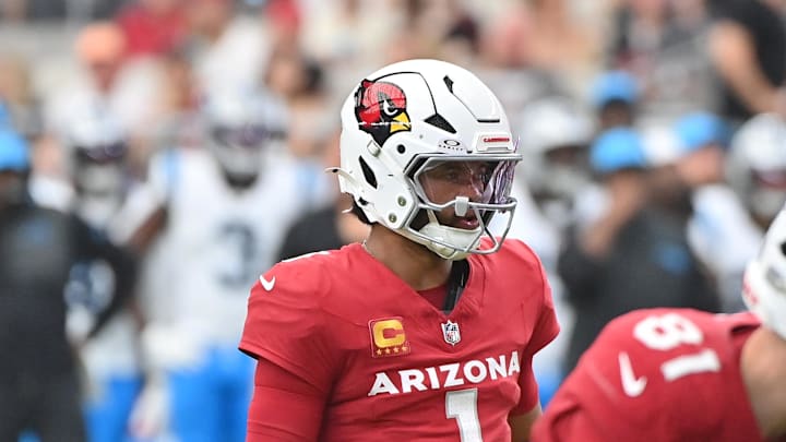 Sep 14, 2025; Glendale, Arizona, USA;  Arizona Cardinals quarterback Kyler Murray (1) looks on during the first quarter against the Carolina Panthers at State Farm Stadium. Mandatory Credit: Matt Kartozian-Imagn Images