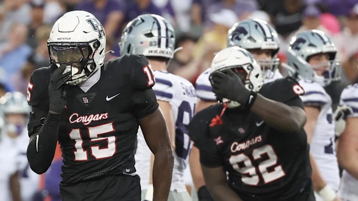 Houston defensive back Hershey McLaurin (15) reacts after tackling Kansas State running back DJ Giddens (31) Houston defensive back Hershey McLaurin (15) reacts after tackling Kansas State running back DJ Giddens (31)