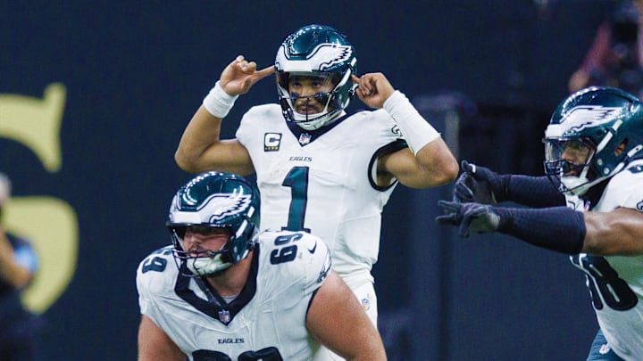 Sep 22, 2024; New Orleans, Louisiana, USA; Philadelphia Eagles quarterback Jalen Hurts (1) calls a play at the line against the New Orleans Saints during the second half at Caesars Superdome. 