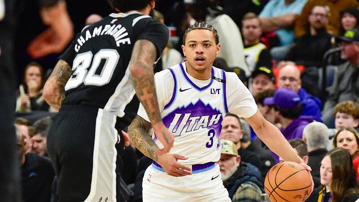 Jan 22, 2026; Salt Lake City, Utah, USA; Utah Jazz guard Keyonte George (3) dribbles against San Antonio Spurs forward Julian Champagnie (30) during the second half at Delta Center. Mandatory Credit: Peter Creveling-Imagn Images Jan 22, 2026; Salt Lake City, Utah, USA; Utah Jazz guard Keyonte George (3) dribbles against San Antonio Spurs forward Julian Champagnie (30) during the second half at Delta Center. Mandatory Credit: Peter Creveling-Imagn Images