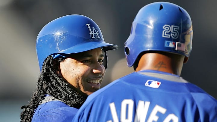 August 1, 2008: Los Angeles, CA, USA: Los Angeles Dodgers left fielder Manny Ramirez (99) speaks with center fielder Andruw Jones (25) before playing against the Arizona Diamondbacks at Dodger Stadium. Mandatory Credit: Gary A. Vasquez-Imagn Images