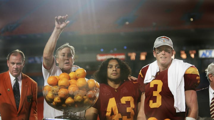 Trojans look on