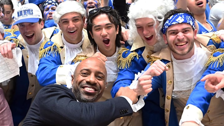 Mar 9, 2024; Durham, North Carolina, USA;  ESPN basketball commentator Jay Williams (front left) greets Duke students prior to a game between the North Carolina Tar Heels and the Duke Blue Devils at Cameron Indoor Stadium. Mandatory Credit: Rob Kinnan-Imagn Images