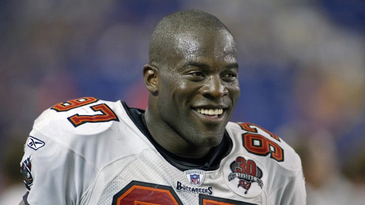 Tampa Bay Buccaneers defensive end Simeon Rice is all smiles after his team scores late in the fourth quarter to ensure their win over the Minnesota Vikings.