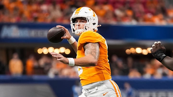 Tennessee quarterback Joey Aguilar (6) scrambles during the Aflac Kickoff Game between the Volunteers and Syracuse held at Mercedes-Benz Stadium in Atlanta, Ga., on August 30, 2025.