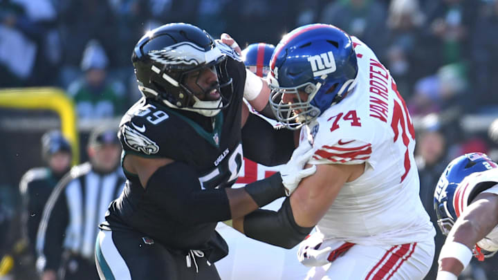 Jan 5, 2025; Philadelphia, Pennsylvania, USA; New York Giants guard Greg Van Roten (74) blocks Philadelphia Eagles defensive tackle Thomas Booker IV (59) at Lincoln Financial Field. Mandatory Credit: Eric Hartline-Imagn Images
