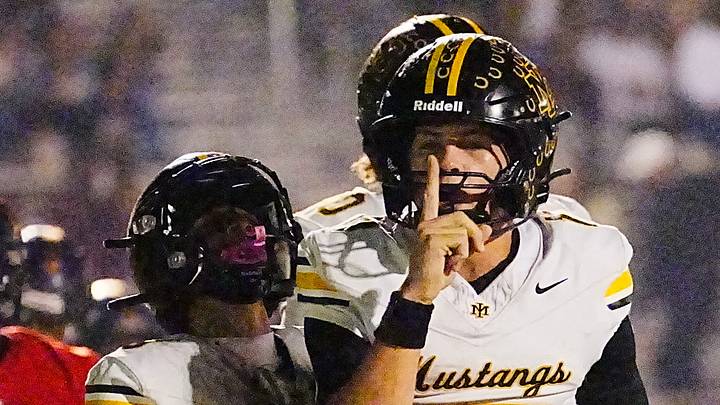 Quarterback Kevin Verpaele (17) of Merritt Island celebrates a touchdown against Eau Gallie in a Class 3A football playoff game last year. He rushed for two touchdowns and passed for two more scores to rally the Mustangs past Ponte Vedra, 45-37, last week. Quarterback Kevin Verpaele (17) of Merritt Island celebrates a touchdown against Eau Gallie in a Class 3A football playoff game last year. He rushed for two touchdowns and passed for two more scores to rally the Mustangs past Ponte Vedra, 45-37, last week.