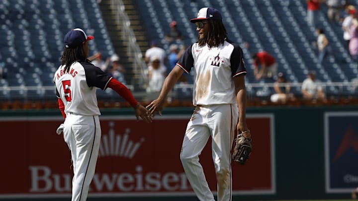 Aug 22, 2024; Washington, District of Columbia, USA; Washington Nationals shortstop CJ Abrams (5) celebrates with Nationals outfielder James Wood (29) after their game against the Colorado Rockies at Nationals Park.