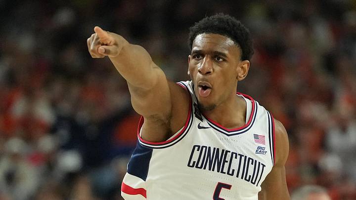 Apr 4, 2026; Indianapolis, IN, USA; UConn Huskies forward Tarris Reed Jr. (5) reacts after a play against the Illinois Fighting Illini during the first half of a semifinal of the Final Four of the men's 2026 NCAA Tournament at Lucas Oil Stadium. Apr 4, 2026; Indianapolis, IN, USA; UConn Huskies forward Tarris Reed Jr. (5) reacts after a play against the Illinois Fighting Illini during the first half of a semifinal of the Final Four of the men's 2026 NCAA Tournament at Lucas Oil Stadium.
