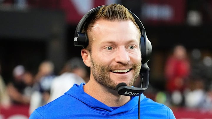 Los Angeles Rams head coach Sean McVay smiles after a touchdown by wide receiver Puka Nacua (12) against the Arizona Cardinals in the second half at State Farm Stadium on Dec 7, 2025, in Glendale, Ariz.