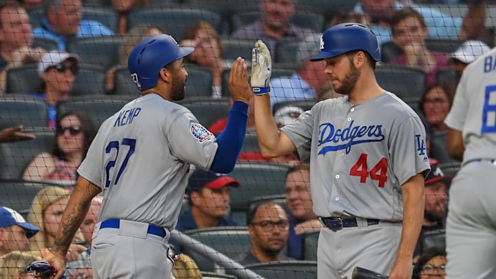 Dodgers right fielder Matt Kemp (27) high fives with starting pitcher Rich Hill (44) after scoring a run against the Atlanta Braves during the fifth inning at SunTrust Park. Dodgers right fielder Matt Kemp (27) high fives with starting pitcher Rich Hill (44) after scoring a run against the Atlanta Braves during the fifth inning at SunTrust Park.