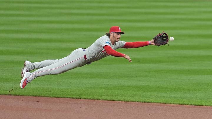 Aug 1, 2026; Baltimore, Maryland, USA; Philadelphia Phillies second baseman Bryson Stott (5) leaps for a line drive base hit by Baltimore Orioles shortstop Gunnar Henderson (not pictured) during the first inning at Oriole Park at Camden Yards. Mandatory Credit: Gregory Fisher-Imagn Images Aug 1, 2026; Baltimore, Maryland, USA; Philadelphia Phillies second baseman Bryson Stott (5) leaps for a line drive base hit by Baltimore Orioles shortstop Gunnar Henderson (not pictured) during the first inning at Oriole Park at Camden Yards. Mandatory Credit: Gregory Fisher-Imagn Images
