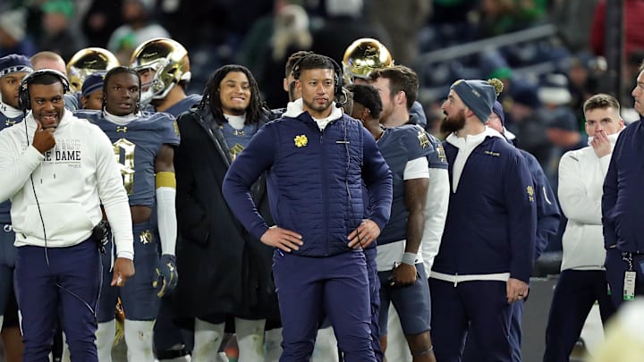 Nov 23, 2024; New York, New York, USA; Notre Dame Fighting Irish head coach Marcus Freeman watches from the sideline during the second half against the Army Black Knights at Yankee Stadium. Mandatory Credit: Danny Wild-Imagn Images