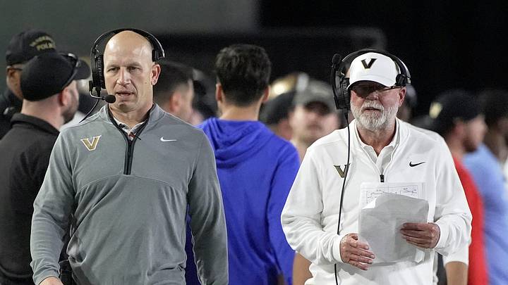 Vanderbilt coach Clark Lea and senior offensive advisor Jerry Kill walk on the sidelines during the third quarter against Kentucky at FirstBank Stadium in Nashville, Tenn., Saturday, Nov. 22, 2025. Vanderbilt coach Clark Lea and senior offensive advisor Jerry Kill walk on the sidelines during the third quarter against Kentucky at FirstBank Stadium in Nashville, Tenn., Saturday, Nov. 22, 2025.