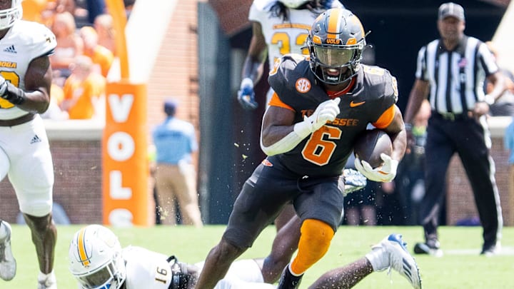 Tennessee running back Dylan Sampson (6) runs with the ball during Tennessee's game against Chattanooga in Neyland Stadium in Knoxville on Saturday, Aug. 31, 2024.